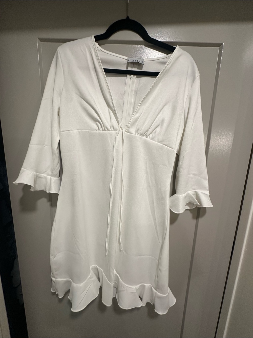 Lioness White V-Neck Ruffle Tunic